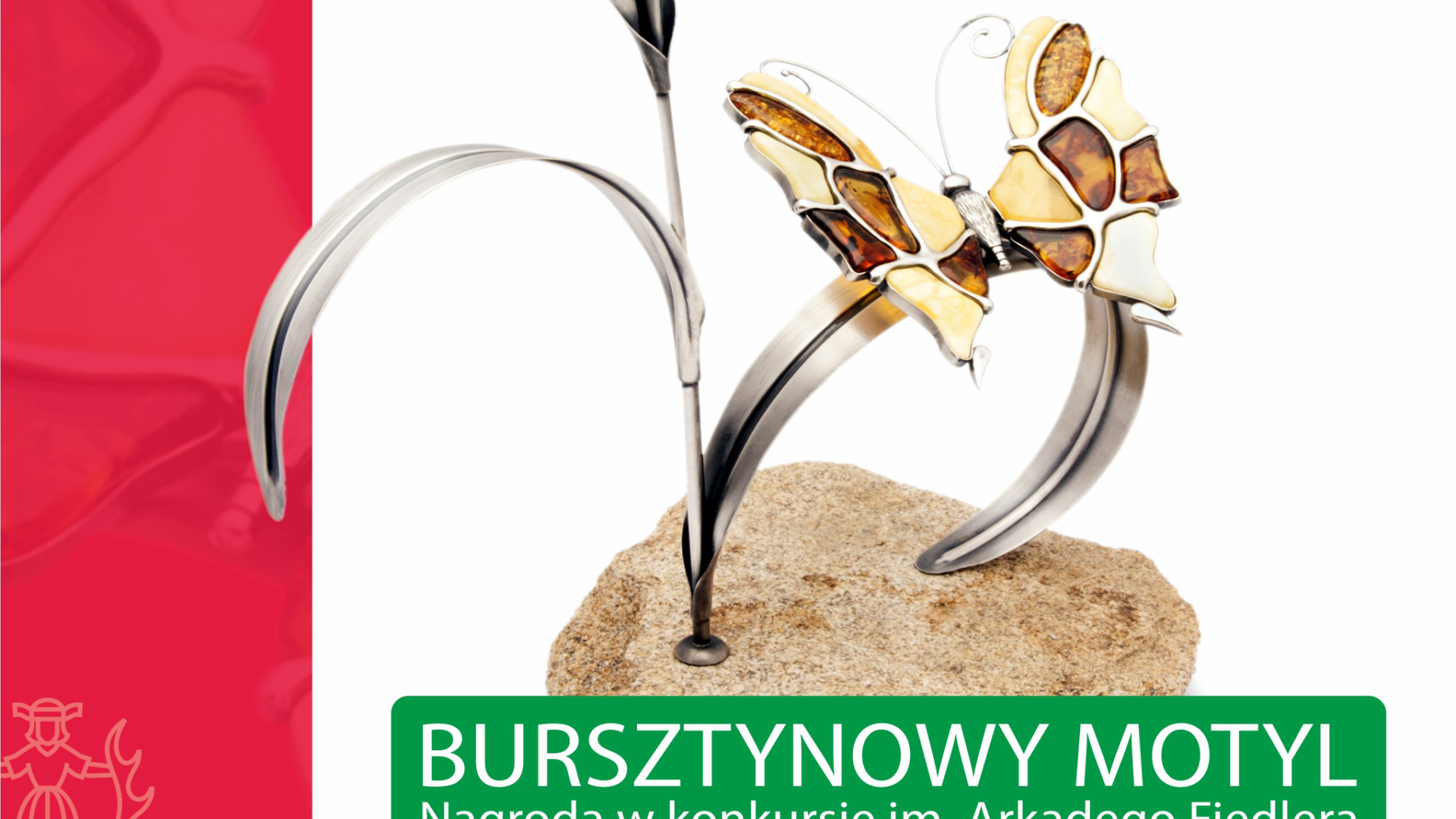 Obrazek do wydarzenia. Na białym tle widnieje statuetka Bursztynowego Motyla. Z kamiennej podstawy wyrasta srebrny liść , na którym umieszczony jest motyl wykonany z bursztynu.